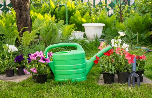 Gardener introducing professional garden care in Cranford